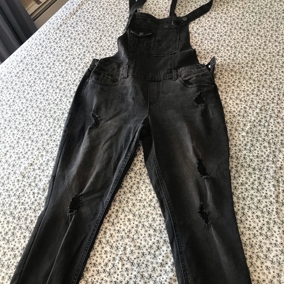 Skinny leg farmer jean one piece with rips on legs - Picture 3 of 5